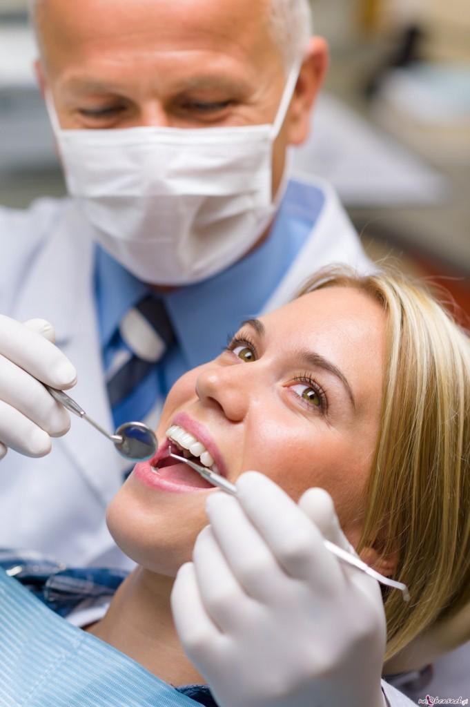 White teeth woman patient at the dentist