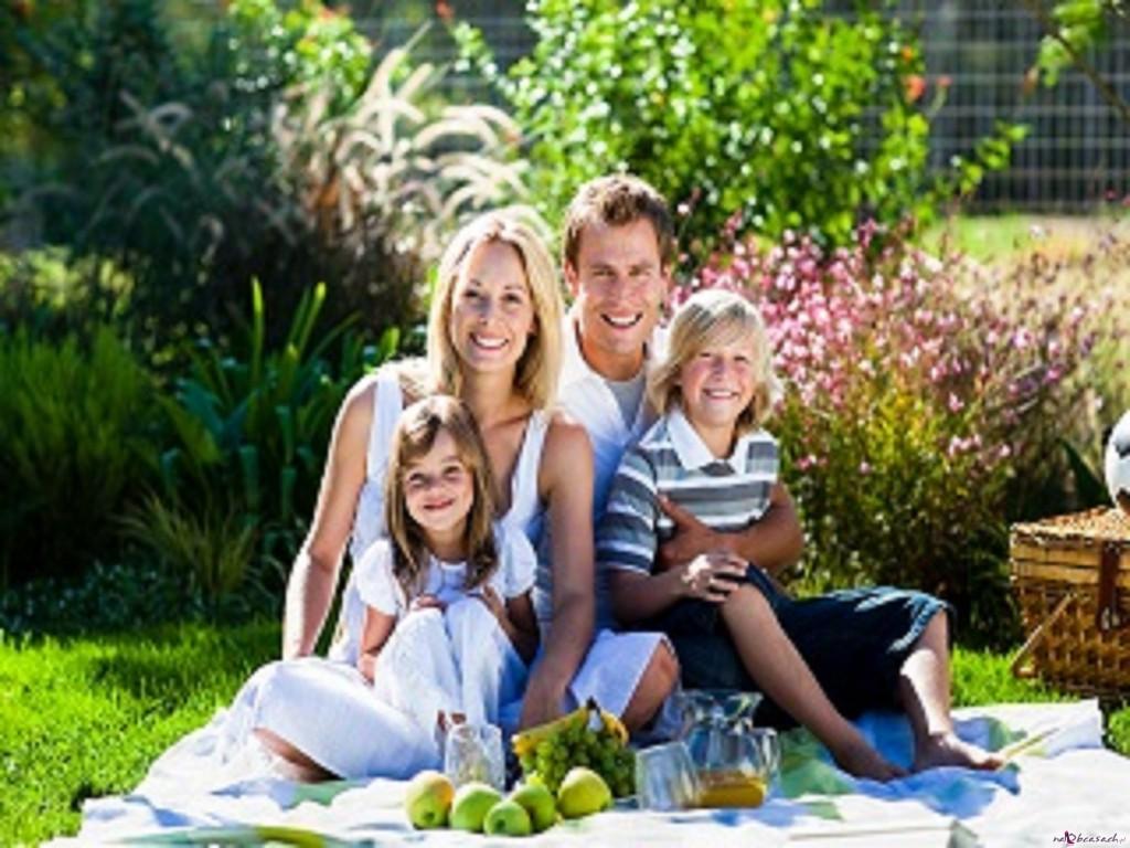 Young family having picnic in a park