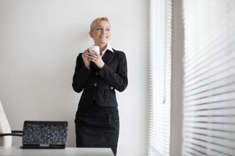business woman with a cup of coffee