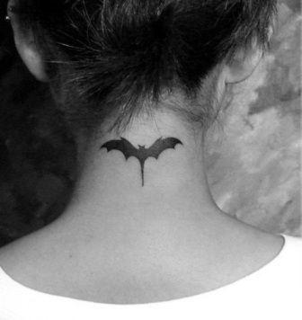 small-bat-tattoo-on-back-neck