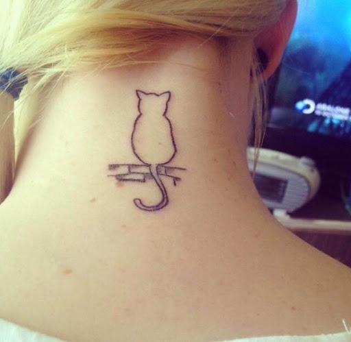 small outline cat tattoo