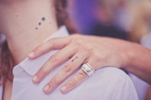 small star tattoos on neck