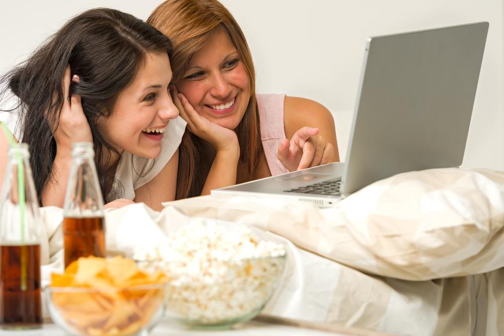 Teenagers friends enjoy movie night