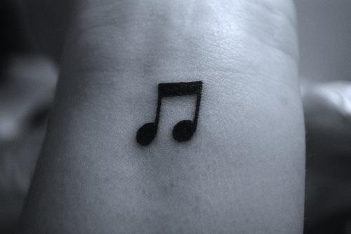 a-cute-music-note-tattoo-on-wrist