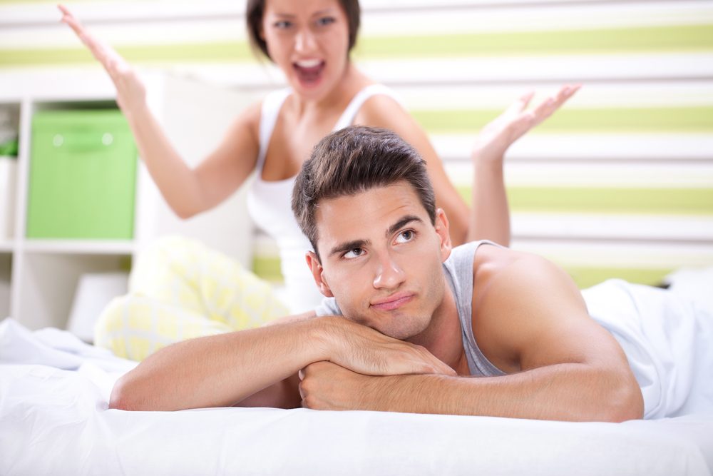 Young couple having an argument in the bedroom