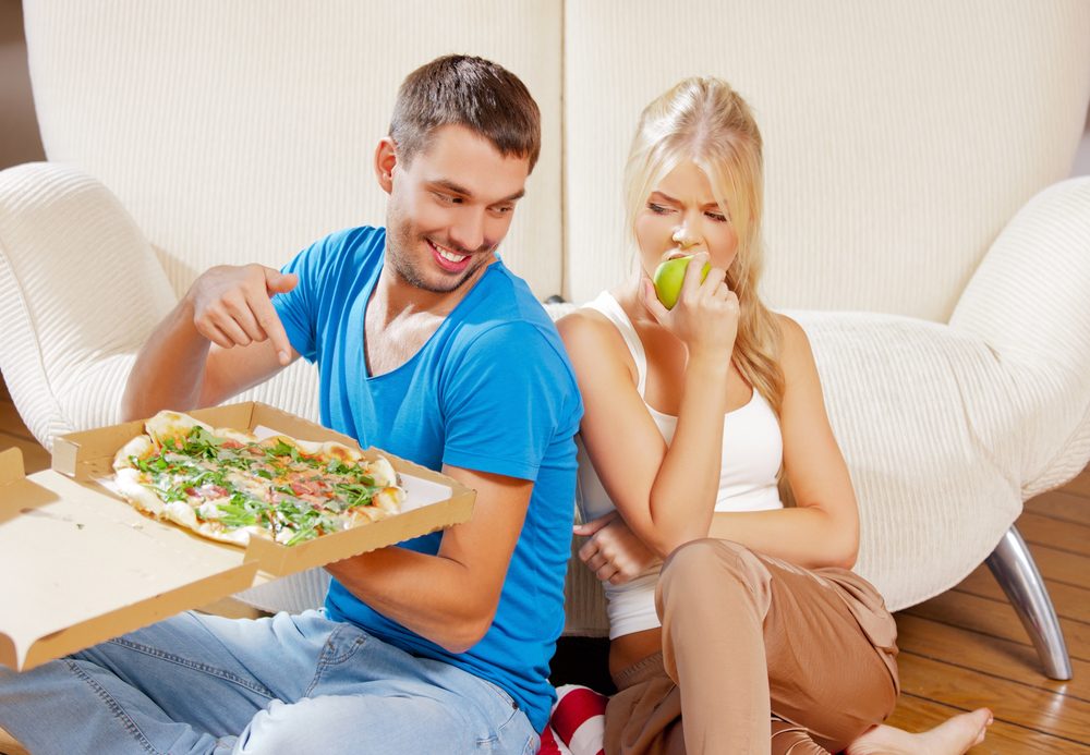bright picture of couple eating different food