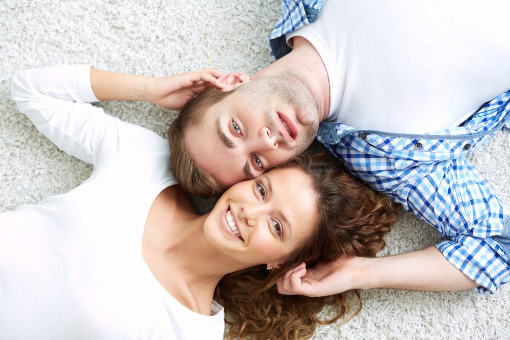 Portrait of smiling young people being in a happy relationship