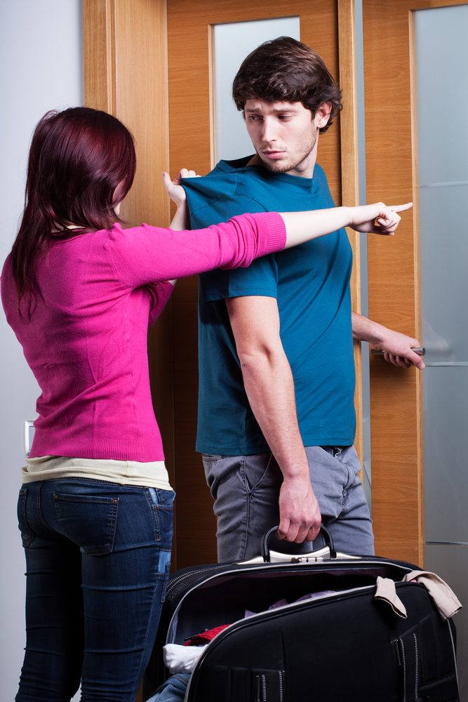 Angry woman imploring her boyfriend from home after the quarrel