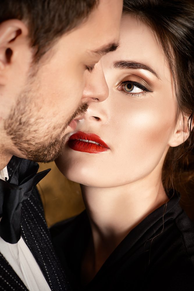 Close-up portrait of a beautiful man and woman in love. Fashion. Love concept.